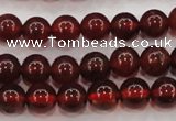 CGA601 15.5 inches 6mm A grade round natural orange garnet beads