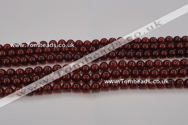 CGA608 15.5 inches 7mm AA grade round natural orange garnet beads