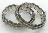 CGB3463 7.5 inches 10*14mm faceted oval smoky quartz bracelets