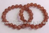 CGB4544 7.5 inches 10mm round golden sunstone beaded bracelets