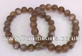 CGB4549 7.5 inches 9mm - 10mm round sunstone beaded bracelets