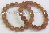 CGB4614 10mm - 11mm round golden rutilated quartz beaded bracelets