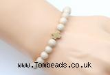 CGB9360 8mm, 10mm white fossil jasper & cross hematite power beads bracelets