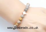 CGB9434 8mm, 10mm matte fossil coral & cross hematite power beads bracelets