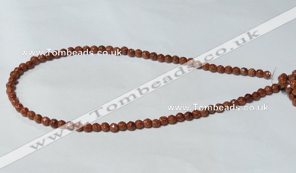 CGS57 15.5 inches 6mm faceted round goldstone beads wholesale