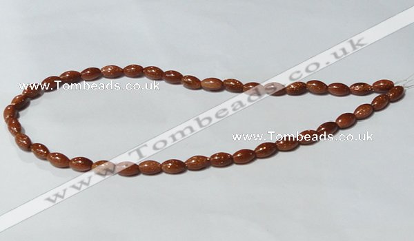 CGS69 15.5 inches 6*10mm rice goldstone beads wholesale