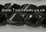 CHE161 15.5 inches 6*12mm twisted rice hematite beads