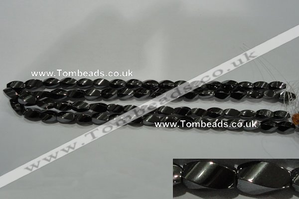 CHE161 15.5 inches 6*12mm twisted rice hematite beads