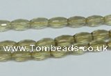 CLQ10 15.5 inches 6*10mm faceted rice natural lemon quartz beads