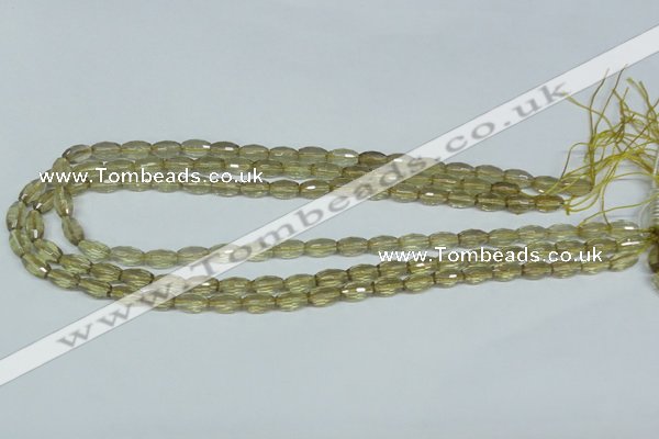 CLQ11 15.5 inches 8*12mm faceted rice natural lemon quartz beads