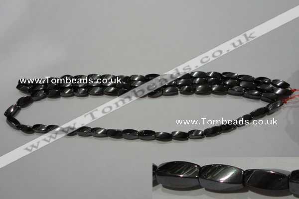 CMH152 15.5 inches 5*11mm twisted rice magnetic hematite beads