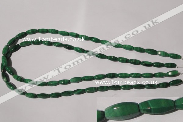 CMN224 15.5 inches 5*12mm faceted rice natural malachite beads