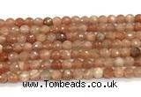 CMS2258 15 inches 6mm faceted round orange moonstone beads