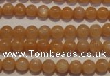 CMS701 15.5 inches 6mm round peach moonstone beads wholesale