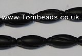 CNE15 15.5 inches 9*20mm carved rice black stone needle beads wholesale
