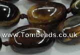 CNG353 15.5 inches 15*20mm - 20*35mm nuggets tiger eye beads