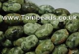 CPS10 15.5 inches 8*12mm rice green peacock stone beads wholesale