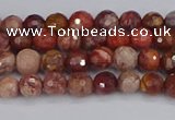 CRO1188 15.5 inches 4mm faceted round red porcelain beads