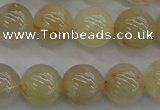 CRU583 15.5 inches 10mm round golden rutilated quartz beads