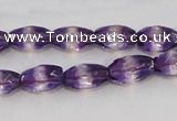 CSA25 15.5 inches 7*12mm faceted rice synthetic amethyst beads