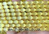 CSE744 15 inches 6*9mm rice selenite beads wholesale