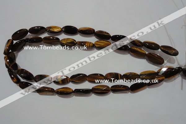 CTE1098 15.5 inches 10*20mm twisted & faceted oval yellow tiger eye beads