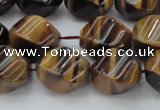 CTE1590 15.5 inches 10*14mm twisted rice yellow tiger eye beads