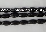 CTO116 15.5 inches 5*10mm faceted rice black tourmaline beads