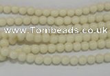 CTU1431 15.5 inches 4mm round synthetic turquoise beads