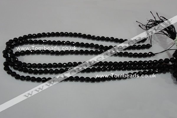 CTU1481 15.5 inches 4mm faceted round synthetic turquoise beads