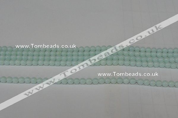 CTU2563 15.5 inches 4mm round synthetic turquoise beads