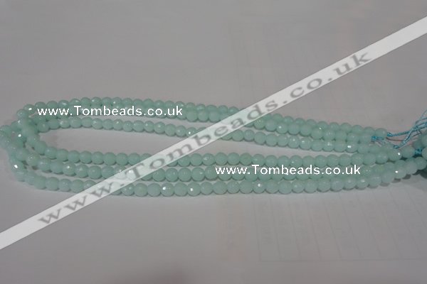 CTU2572 15.5 inches 6mm faceted round synthetic turquoise beads