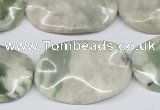 CTW307 15.5 inches 20*30mm wavy oval peace stone beads