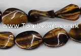 CTW63 15.5 inches 13*18mm twisted oval yellow tiger eye beads