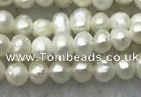 FWP05 14.5 inches 2mm - 2.5mm potato white freshwater pearl strands