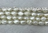 FWP286 15 inches 9mm - 10mm baroque white freshwater pearl strands