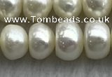 FWP323 15 inches 7mm - 8mm button white freshwater pearl strands